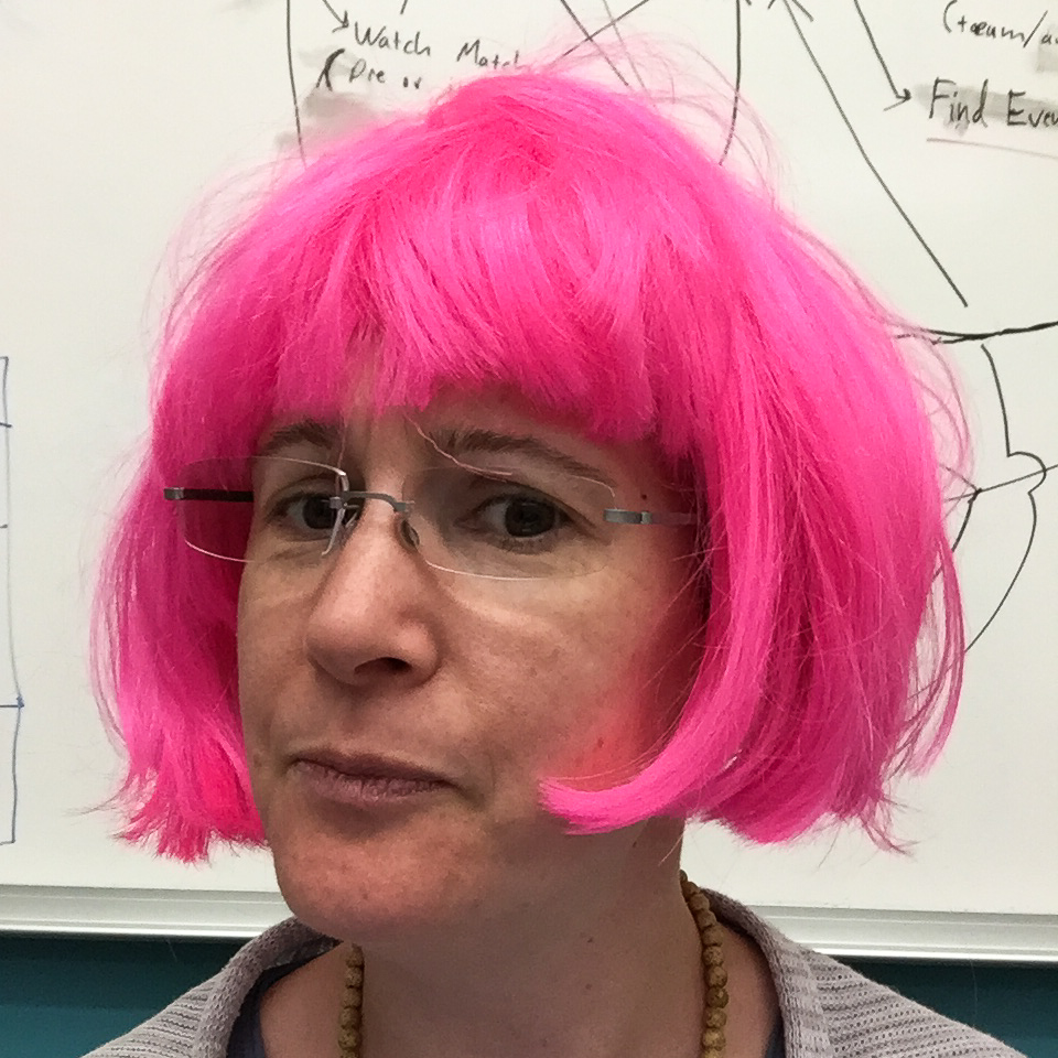 judith in a pink wig